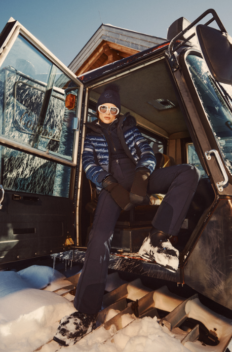 a lady in a ski jacket.