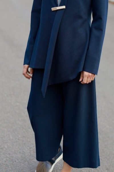 MARITA HUURINAINEN dark coloured garments.