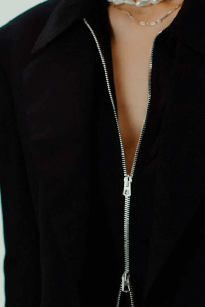 HOPE black garment detail.